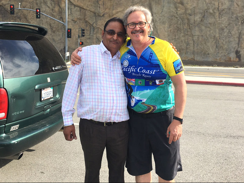 Mr. Tanjit and I at the parking area near Pacifica Beach, California